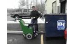 Waste Container Puller pulls heavy trash container Video