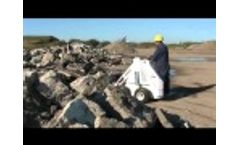 RAMROD Mini Skid Loader 930 - Moving Rocks Video