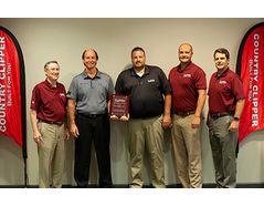 Country Clipper presents distributor of the year Award to Marr Bros., Inc.