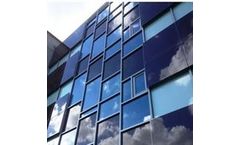 Photovoltaic Glass Panels for Solar Building-Integrated PV Façades and Glazing