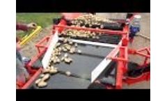 DOWNS fieldloader with hopper,coils, inspection table, telescopic elevator to load potatoes in field Video