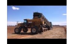 Trout River Rear Lift Unloading Into Lime Spreader Video