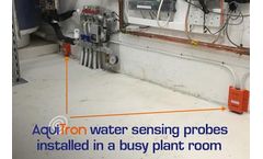 AquiTron water sensing probes installed in a busy plant room