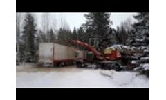 Wood Chipping to Semitrailer in Winter Condition Roads Video