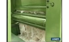 Machine for the Feeding of Tearing Machines in Flock Elaboration and Textile Recycling Video