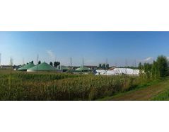 A biogas plant built near agricultural fields to reuse waste and produce energy.