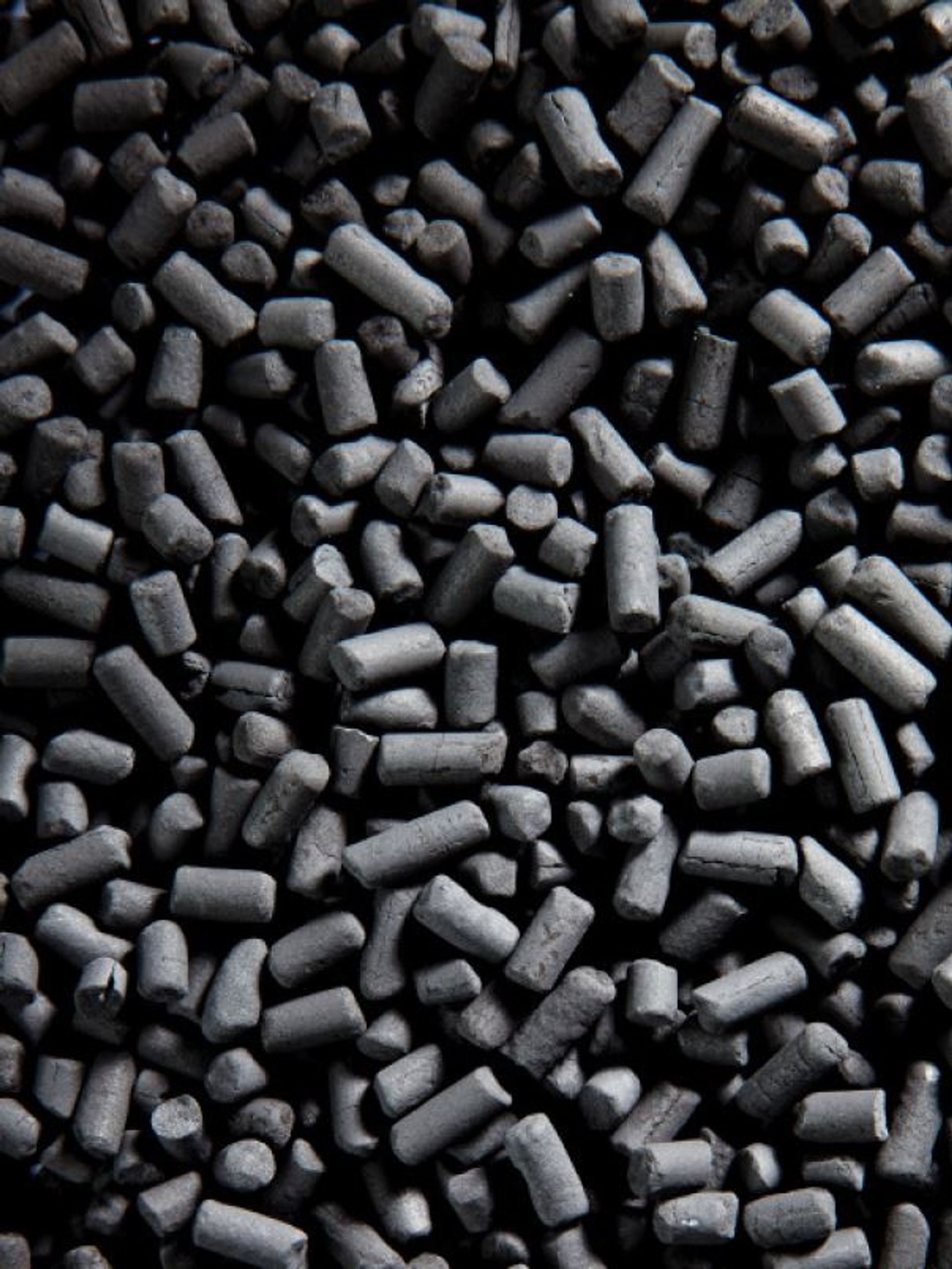 Anhydrous Carbon Pellets—An Engineered CPC Raw Material