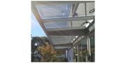 Dual-Side Solar Glass for Buildings