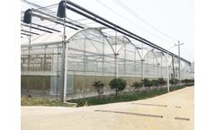 Greenhouse With Motorized Roof Vent