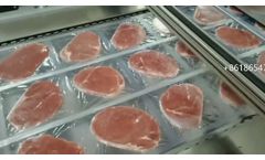 Thermoforming vacuum packaging machine for meat beef steaks - Video