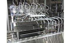 M&O Perry Industries - High Speed Liquid Filling and Stoppering Machine