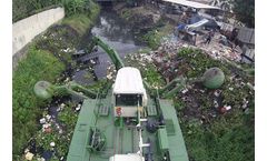Amphibious multipurpose dredger solutions for prevent floods and clean the environment sector