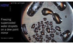 Freezing supercooled water droplets on a dew point mirror  - Video