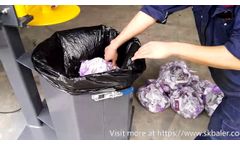 Vertical garbage baler compactor, marine baler, waste baling machine by Skbaler - Video
