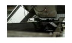 Feeding and Distribution of Wet Material Above the Roller Press - Video