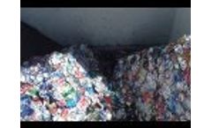 Saturn Quad Shaft Shredder Model Q65 Shredding UBC Bales. Hybrid Drive Technology Video