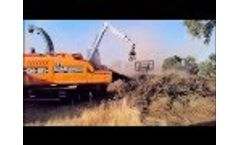 Marchesi Forestry Crane M12RS 02.97 at Work on Doppstadt Chipper Video