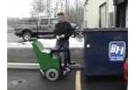 Waste Container Puller pulls heavy trash container Video