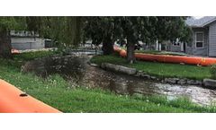 Flood Barrier for River Crossings
