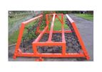 Symms Fabrication - Hydraulic Chain Harrow with Mounted Wings for Soil Preparation
