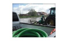 High-calcium lime slurry for environmental reclamation industry