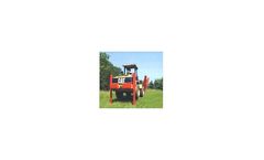 Skid Loaders with Rear Stabilizers