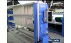 Spreading, Cutting and Stacking Machine from A-Frames for Fabrics Nonwoven and Plastics. - Video